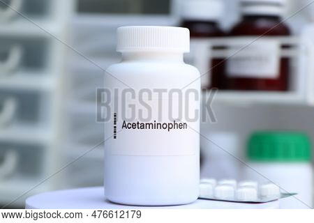 Acetaminophen Pill In White Bottle, Pill Stock, Medical Or Pharmacy Concept