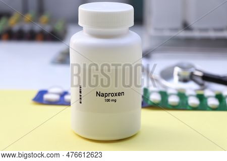 Naproxen Pill In White Bottle, Pill Stock, Medical Or Pharmacy Concept