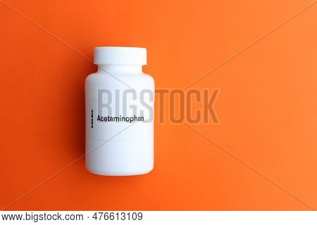 Acetaminophen Pill In White Bottle, Pill Stock, Medical Or Pharmacy Concept