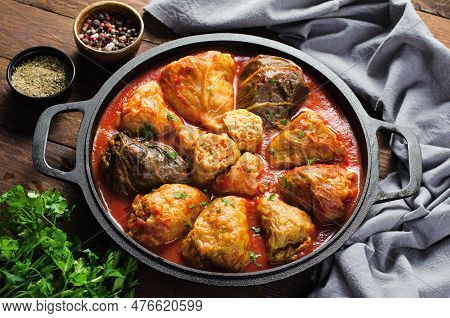 Cabbage Rolls With Ground Meat, Rice And Vegetables Also Known As Sarma, Golubtsy, Dolma On Rustic W