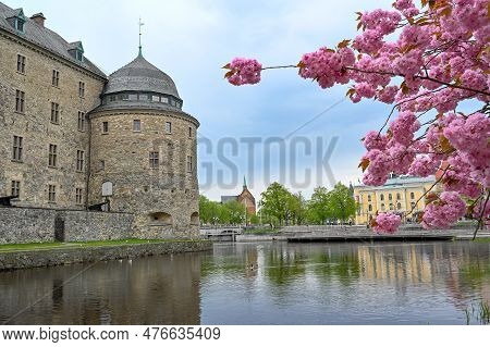 Orebro Castle And Cherry Trees Orebro Sweden May 15 2023