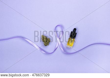 The Symbol Of The Day Of Epilepsy From A Purple Ribbon, Around The Edges Of It Is A Dry Bud Of Medic