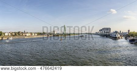 Skyline Of Cologne With River Rhine In Late Afternoon