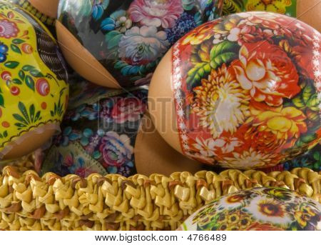 The Easter Decorated Eggs Lying In A Wattled Basket. Macro Shooting