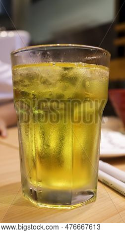 Japanese Green Tea Or Ocha Tea Or Yellow Drink Tea Served In A Tall Glass. Ryokucha Japanese Tea.