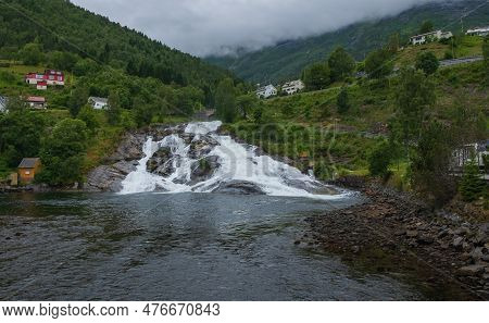 Hellesylt, Norway - July 2019: Hellesyltfossen Is One Of Many Norwegian Waterfalls In The Area Geira