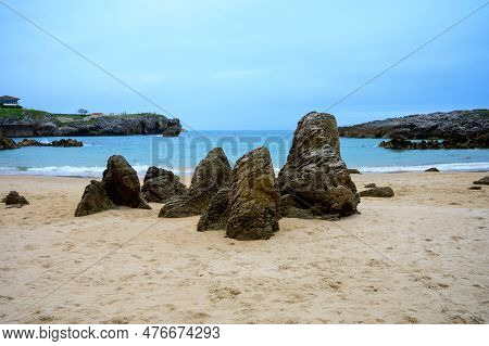 View On Playa De Toro In Llanes, Green Coast Of Asturias, North Spain With Sandy Beaches, Cliffs, Hi