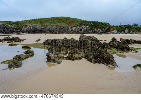 View On Playa De Borizo In Celorio, Green Coast Of Asturias, North Spain With Sandy Beaches, Cliffs,