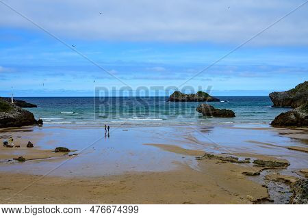 View On Playa De Palombina Las Camaras In Celorio, Green Coast Of Asturias, North Spain With Sandy B