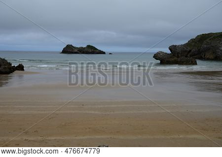 View On Playa De Palombina Las Camaras In Celorio, Green Coast Of Asturias, North Spain With Sandy B