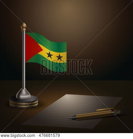 National Flag Of Sao Tome And Principe. Table Flag Metallic Stand With Silver Base. Spotlight In The