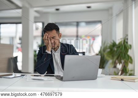 Tired Exhausted Business Man Office Worker Sitting At His Desk Tired Of Working In A Laptop, Overwor