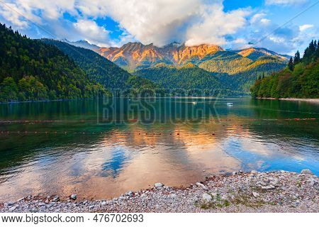 Lake Ritsa Panoramic View At Sunset. Lake Ritsa Is A Lake In The Caucasus Mountains In Abkhazia Regi