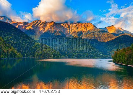 Lake Ritsa Panoramic View At Sunset. Lake Ritsa Is A Lake In The Caucasus Mountains In Abkhazia Regi