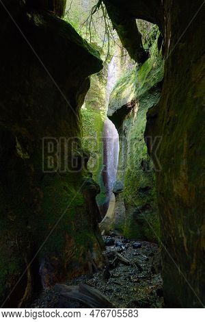 Sombrio Beach Waterfall Narrow Canyon. The Hidden Waterfall Inside A Mossy Canyon At Sombrio Beach, 