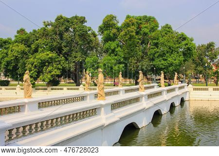 Ornate Bridge With Statues Through Stunning Artificial Lake Near Royal Residence Of The Summer Palac