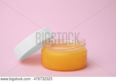 Open Jar With Petrolatum On Pink Background