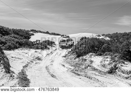 Struisbaai, South Africa - Sep 22, 2022: A Pick-up Truck Is Visible On The Road To The Struisbaai Pl
