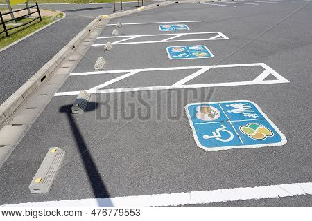 Road Marking For Handicapped Parking Stall In A Parking Lot