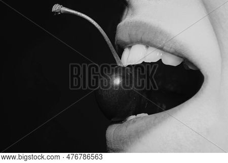 Summer Sexy Fruits. Cherry In Teeth, Macro, Close Up. Cherry In Woman Mouth. Cherries On Woman Lips.