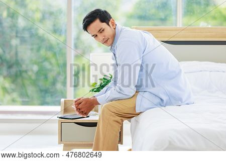 Asian Upset Worried Angry Stressed Frowning Face Male Husband In Casual Outfit Sitting Holding Hands