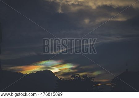 A Rare Look At An Iridescent Cloud. Fire Rainbows Or Rainbow Clouds. Iridescent Pileus Cloud Colorfu