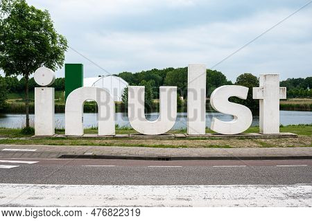 Hulst, Zeeland, The Netherlands - May 21, 2023 - Road Sign At The Entrance Of The Village For Touris