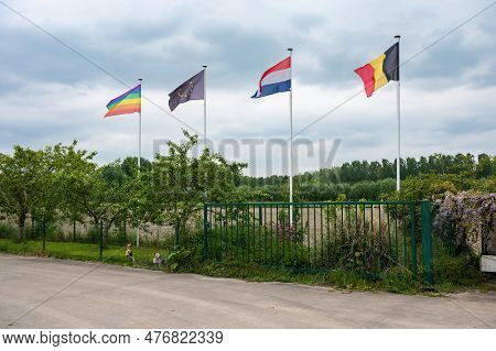 Stekene, East Flemish Region, Belgium - May 21, 2023 - Belgian, Dutch, European And Lgbtq Flag At Th