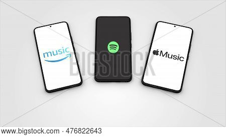 New York, Usa - 1 May 2023: Amazon Music, Spotify And Apple Music App Logo On Phone Screen Illustrat