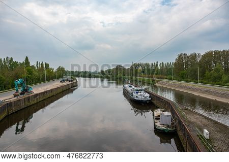 Dendermonde, East Flanders, Belgium - May 1, 2023 - Sluice And Vessels At The River Dender