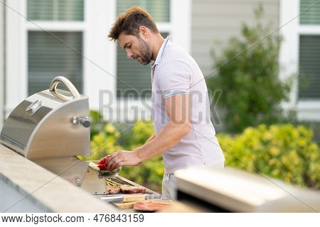 Grill Cook. Chef With Bbq Cooking Tools. Barbecue And Grill. Picnic And Barbecue Party. Chief Cook W