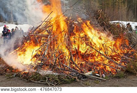 Umea, Norrland Sweden - April 30, 2023: May Bonfire With Crowd In The Background