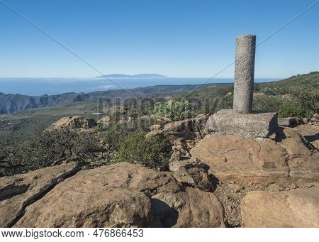 View Of Peak Of Highest Point Of Table Mountain Fortaleza. Rock, Green Hills And Cliffs. La Palma Is
