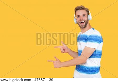 An Estudy Man Wearing Headphones, Copy Space. Estudy Man Takes An Online Course In Studio. Estudy Ma