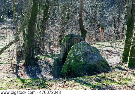 A Stone Of Lies. A Huge Rock In The Woods. A Large Boulder In The Woods. A Splintered Boulder. Kalin