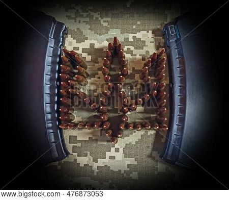 Cartridges For The Kalashnikov Assault Rifle. War Concept. Pile Of Cartridges With Bullets. Pile Of 