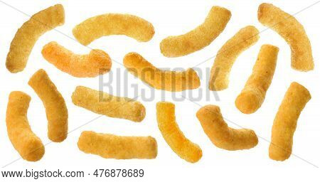 Many Tasty Corn Sticks Falling On White Background