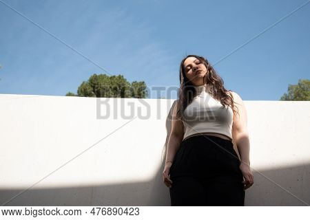 Young Attractive Woman Wearing Casual Clothing Posing Outdoors In The City. Nicosia Cyprus