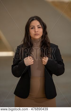 Young Attractive Woman Wearing Casual Clothing Posing Outdoors In The City.