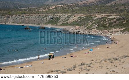 Akamas, Cyprus, July 29 2022: Summer Vacations On Tropical Beach. People In The Sea. Lara Beach, Aka
