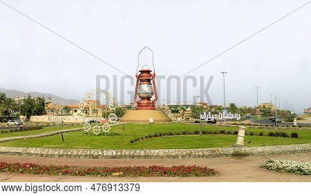Sharjah, United Arab Emirates, March 17, 2023 : View From The Window Of мonument To A Gas Lamp On A 