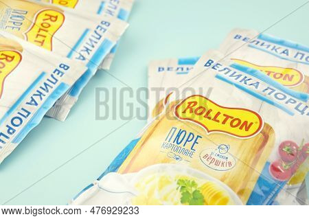 Rollton Instant Mashed Potatoes On A Blue Background. Fast Food, Junk Food.