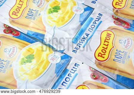 Rollton Instant Mashed Potatoes On A Blue Background. Fast Food, Junk Food.