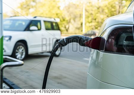Charging Station For Electric Cars. Types And Connectors Of Ports For Charging Vehicles.