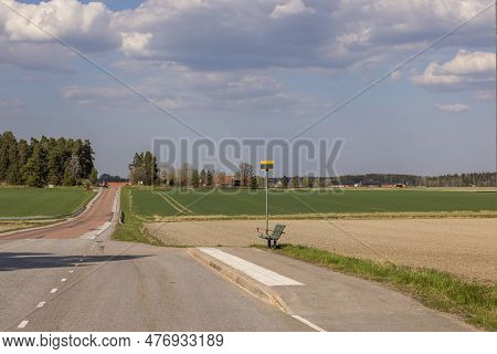 Beautiful View Of Highway In Countryside With Bus Stop. Sweden.