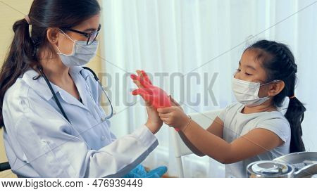 School Girl Visits Skillful Doctor At Hospital For Vaccination . Covid 19 And Coronavirus Vaccinatio
