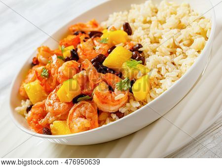 Caribbean Grilled Shrimps With Black Beans, Mango Pineapple Salsa Served With Brown Rice In White Bo
