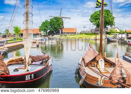 Harderwijk, Netherlands - May 22, 2022: Old Dutch Wooden Sailing Ships In The Inner Harbor Of Harder