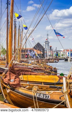 Harderwijk, Netherlands - May 22, 2022: Flags And Ropes On Wooden Sailing Ships In Harderwijk, Nethe