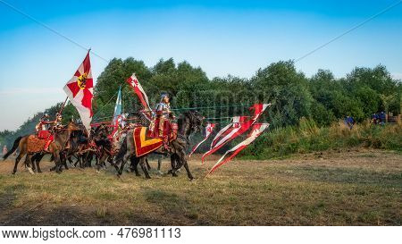 Gniew, Poland, Aug 2020 Hussars Holding Long Lances And Charging On Enemies, Polish Heavy Cavalry, H